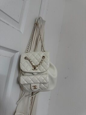 CHANEL Cream Quilted Leather Backpack with Gold-Tone Chain
